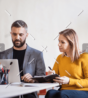 demo-attachment-457-two-business-people-with-wheelchair-in-the-office-PMJT9V5-cropped